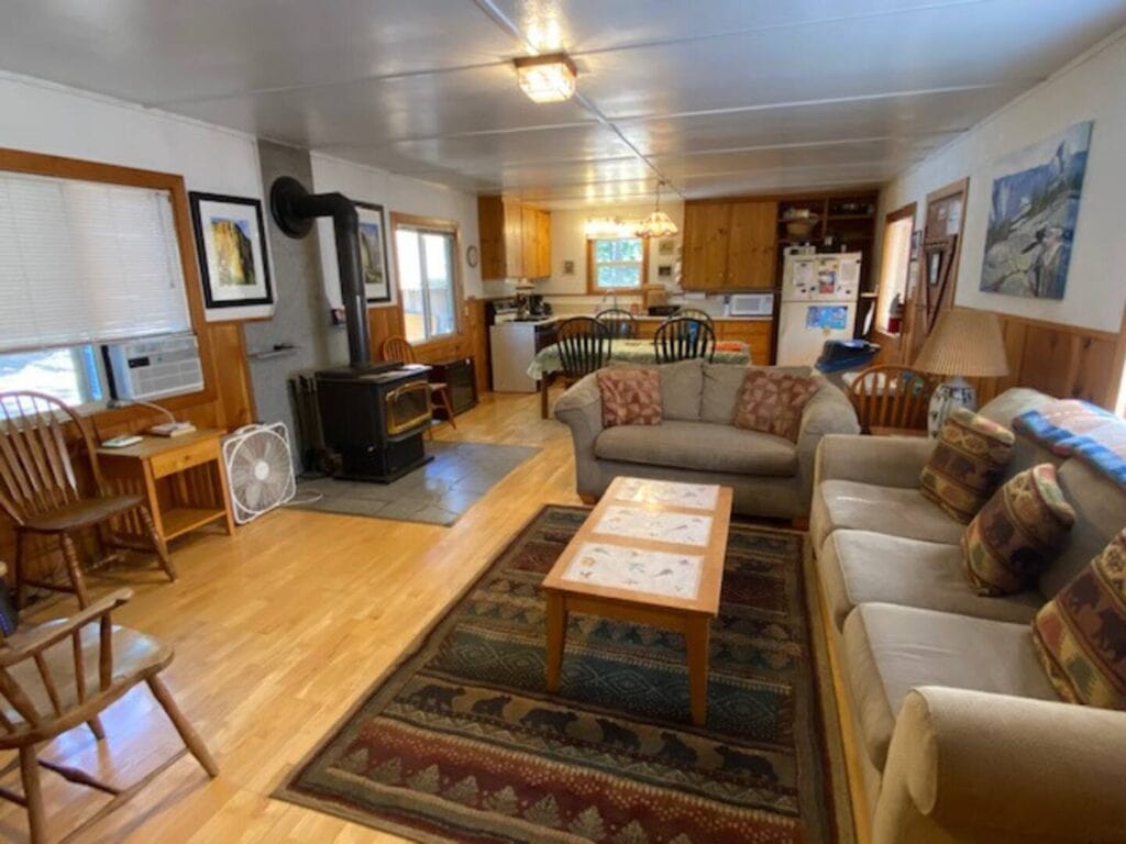 living room with wood stove and living area