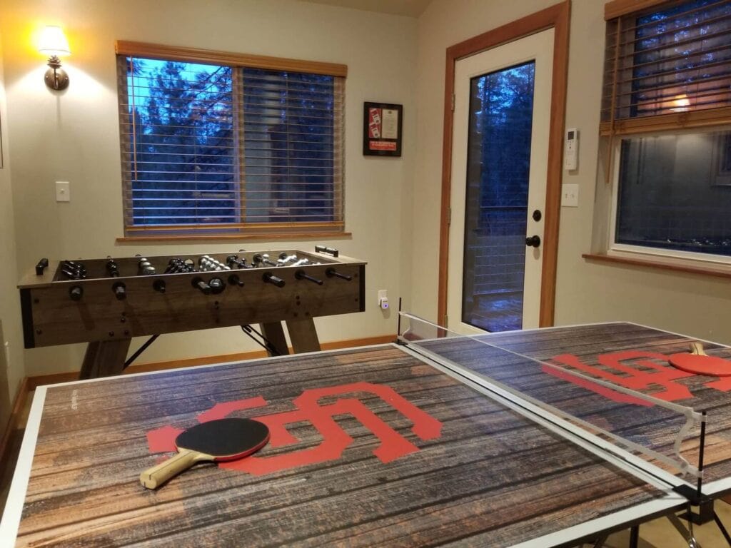 game room foosball and ping pong tables