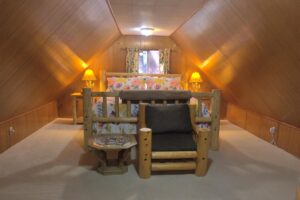 loft bedroom with queen bed