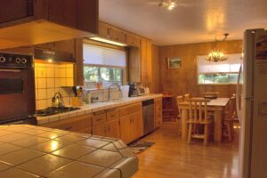kitchen with wood cabinets and dining area
