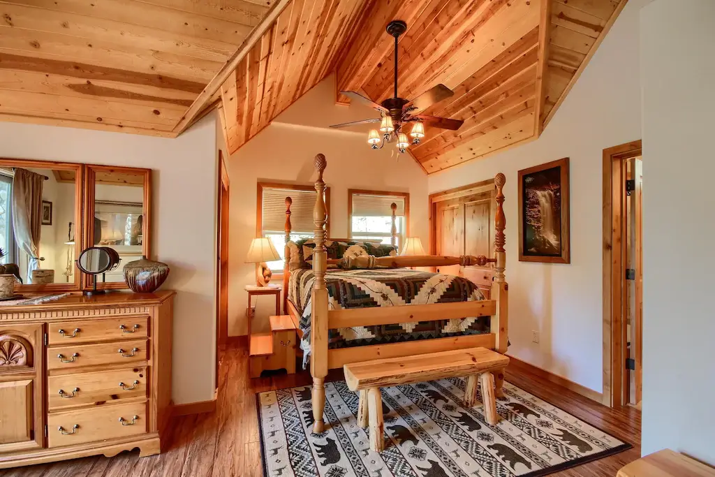 bedroom with wood carved bed