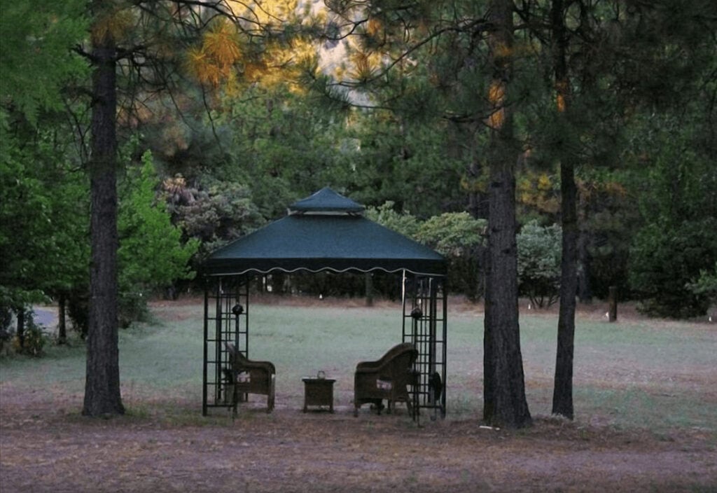 view of property with covered seating