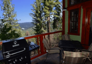 deck with outdoor seating and grill