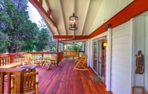 deck with outdoor seating and fire pit