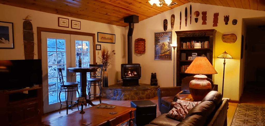 living area with wood stove and seating