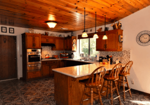 fully equipped kitchen with bar seating