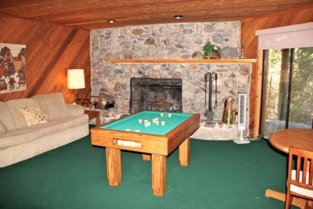 game room with fireplace