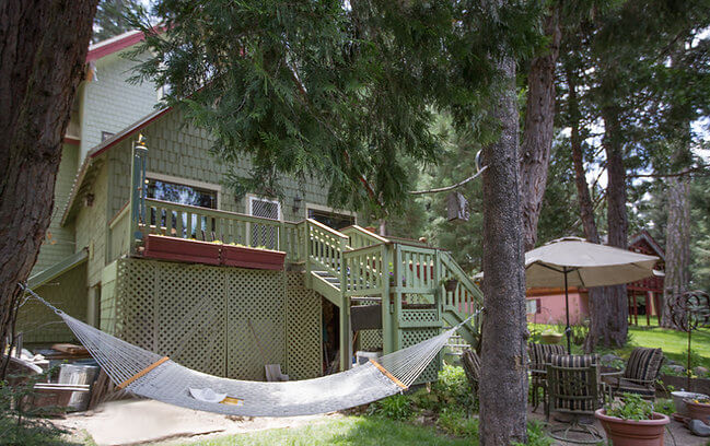 exterior of the house with a hammock