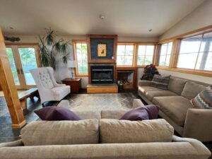 living room with fireplace and seating