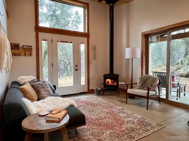 liing area with wood stove and couch