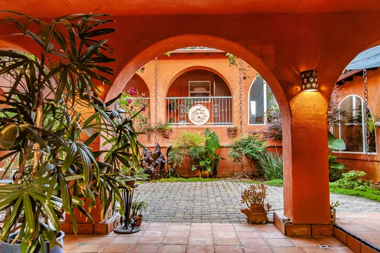 courtyard with arches and plants