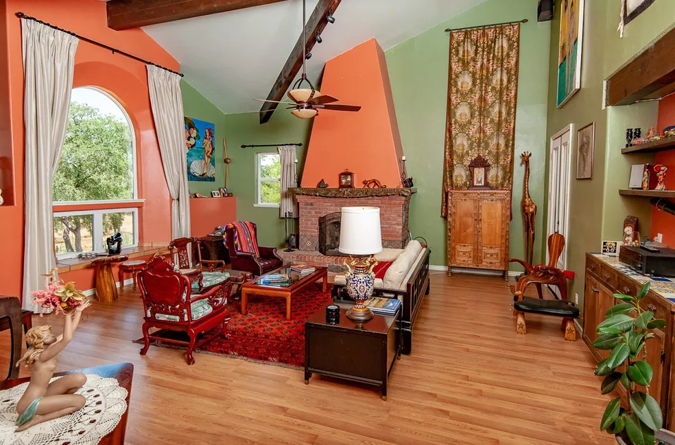 living area with fireplace and couches