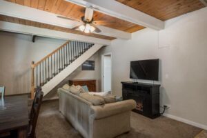 living area with television and couch