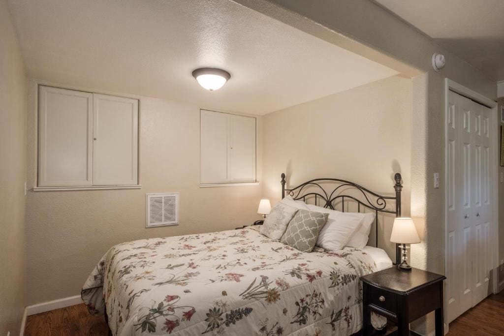 bedroom area with queen bed