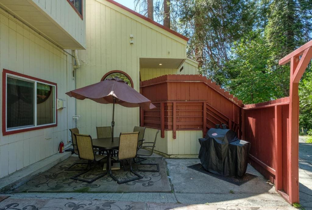 patio with outdoor seating and grill