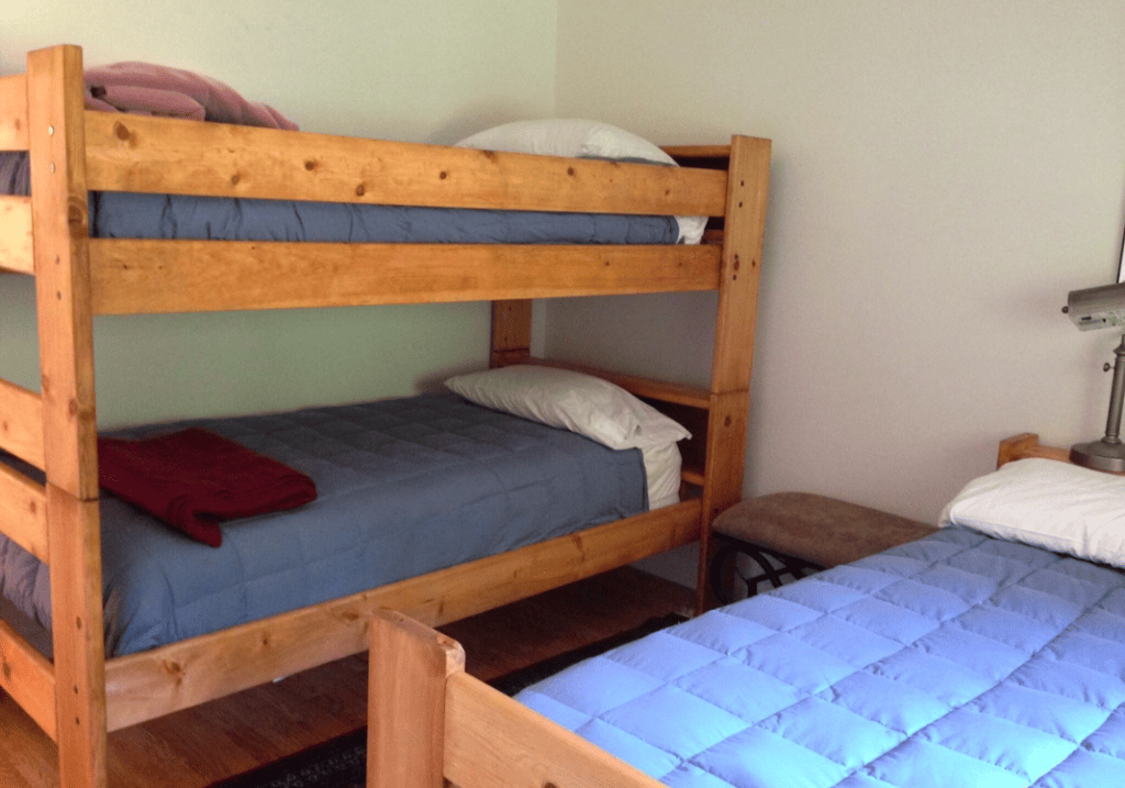 bedroom with full bed and bunk bed