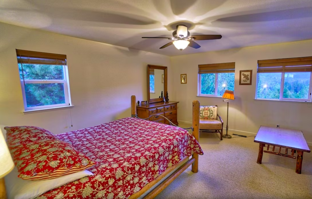 primary bedroom with red bedding