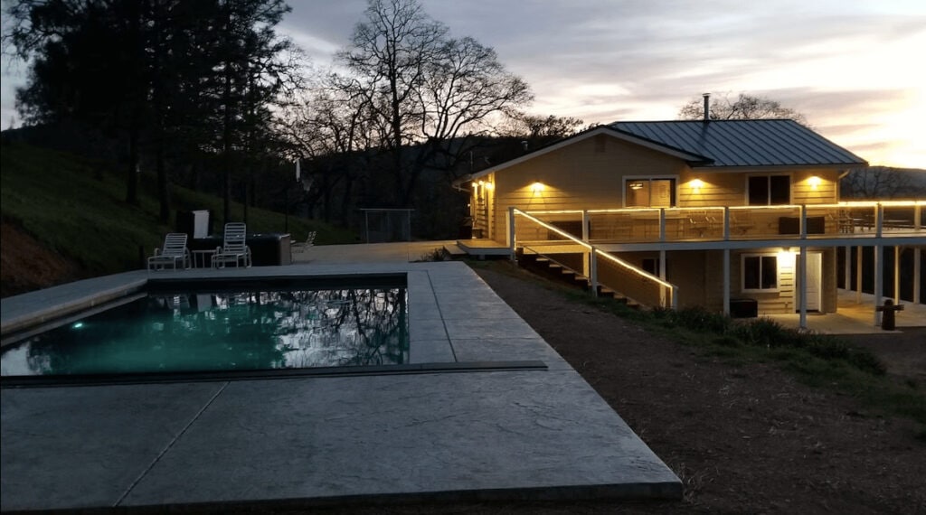 outdoor view of house and pool