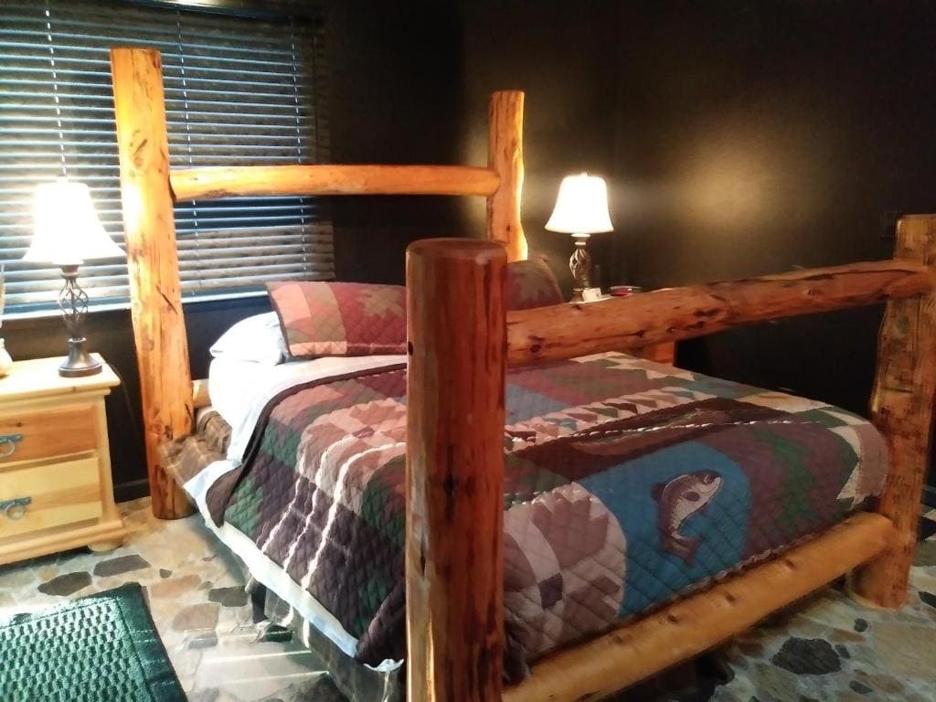 full bed with carved wood bed frame