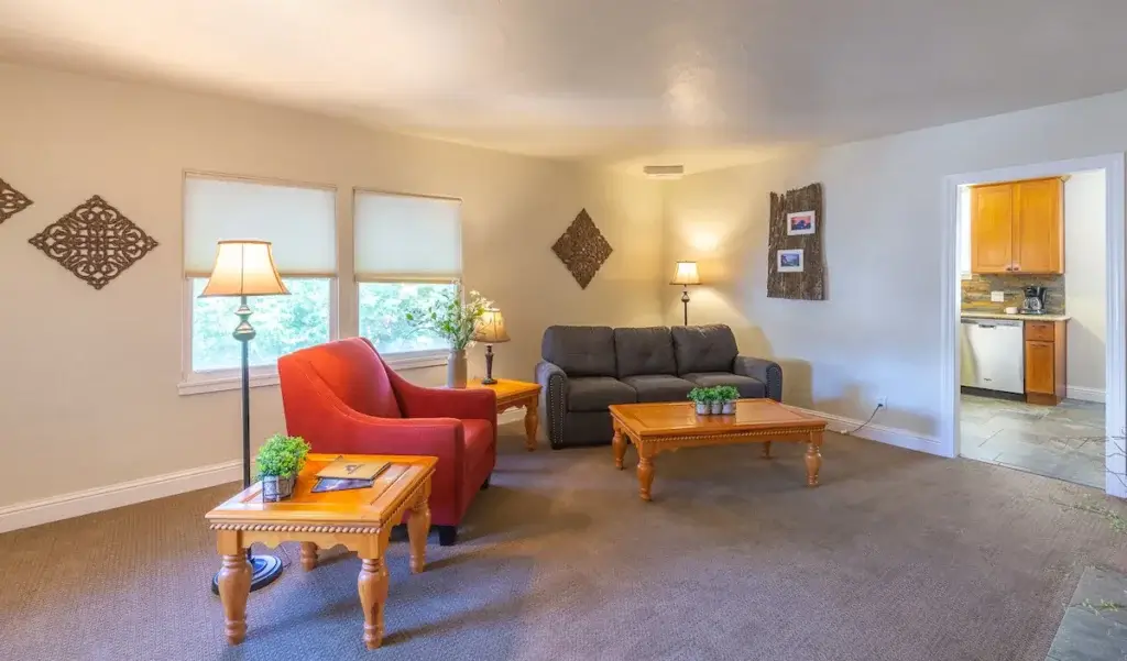 living room with couch and chairs