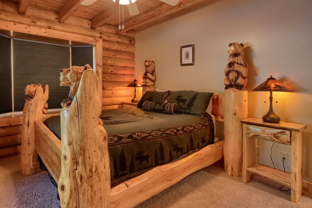 bedroom with carved wood bed frame