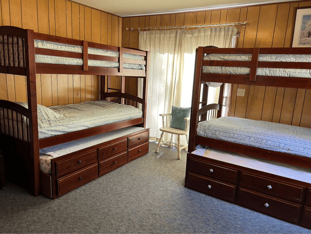 bedroom with two sets of bunkbeds
