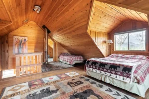 bedroom with queen bed and twin bed