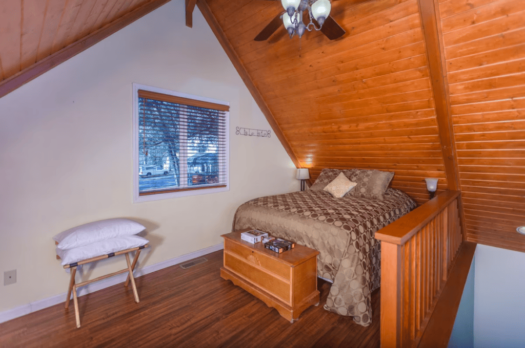 loft bedroom with queen bed