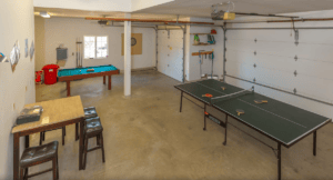 garage game room with game tables
