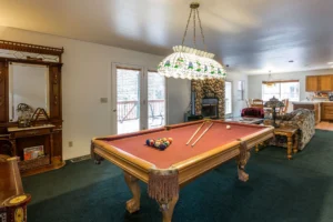 pool table and fireplace