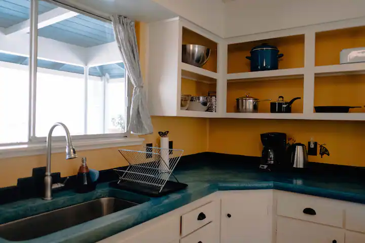 kitchen counter with open shelving