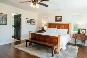 bedroom with wood bedframe
