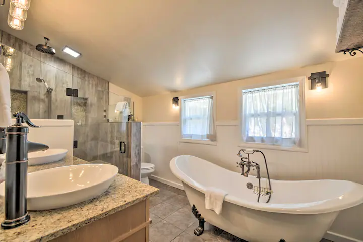 bathroom with tub and shower