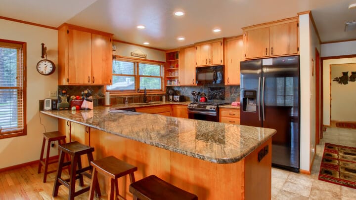 kitchen with bar stools at island