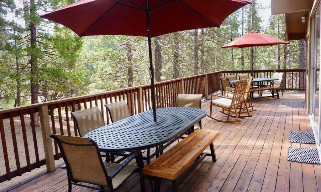 deck with outdoor seating and dining