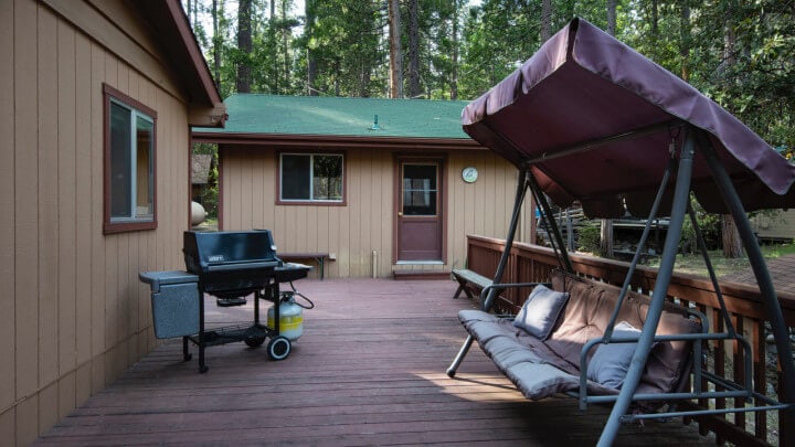 deck with swing and grill