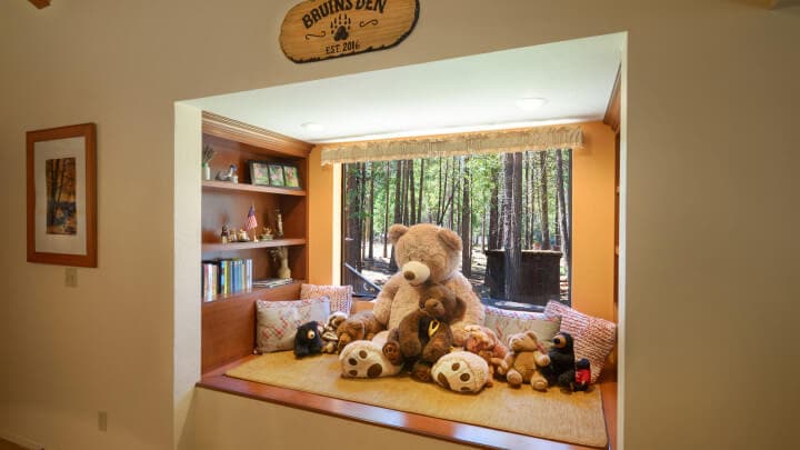 reading nook with stuffed animals and books