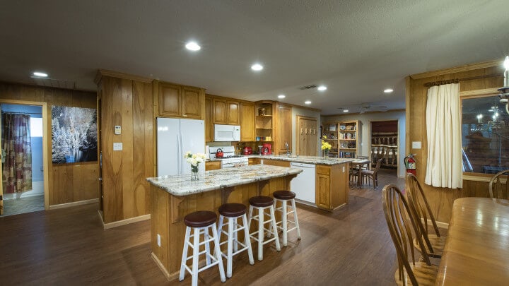 wood kitchen with island bar seating