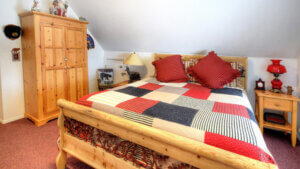 bedroom with patchwork quilt