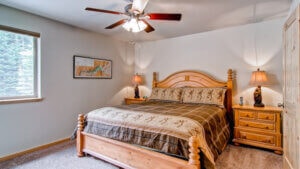 bedroom with wood bedframe