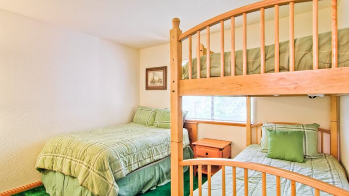 bedroom with bed and bunkbeds