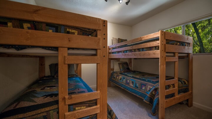 bedroom with four bunk beds