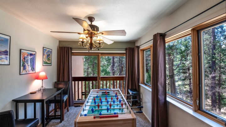 games area of living room with foosball table