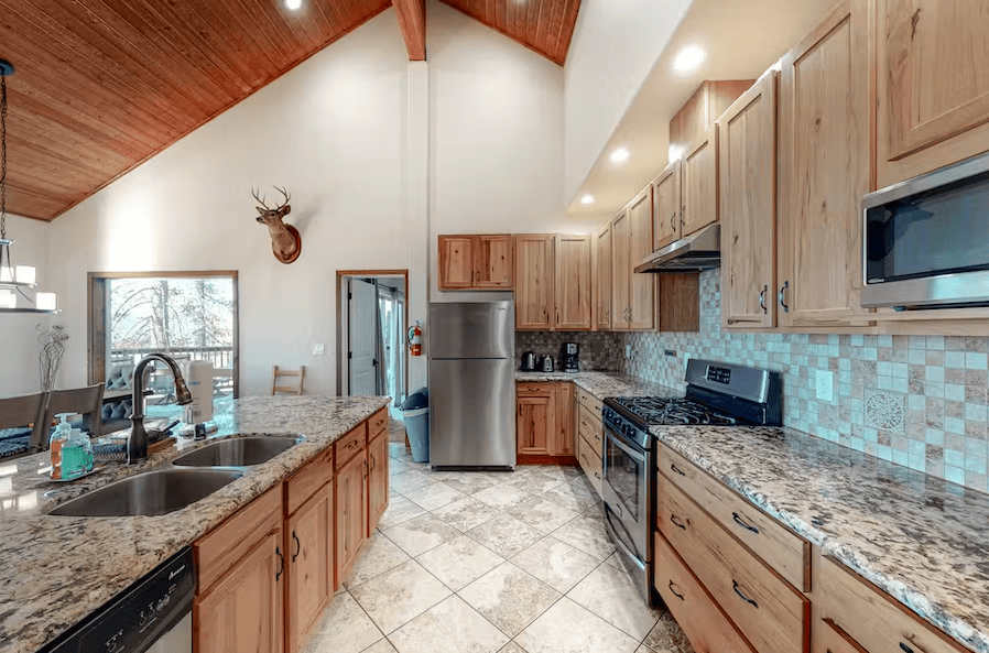 kitchen with wood cabinets and cathedral ceilings