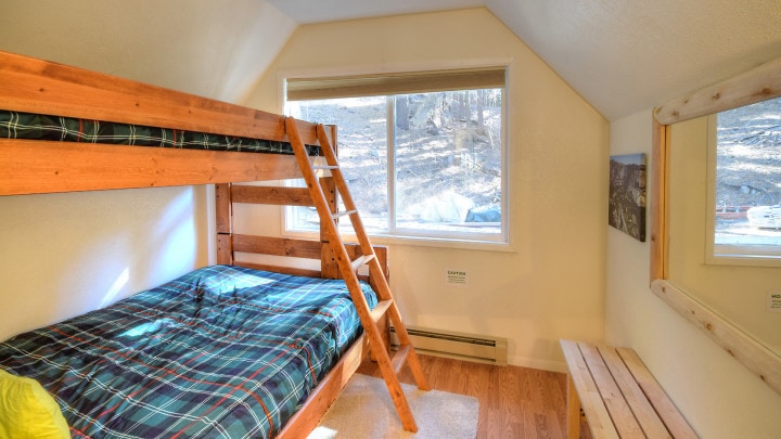 bedroom with bunk beds and window
