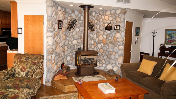 living room with wood stove