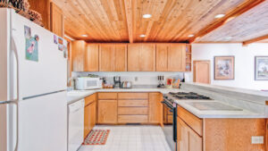 kitchen with wood cabinets and ceiling