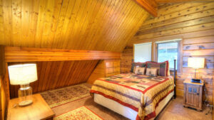 loft bedroom with queen bed