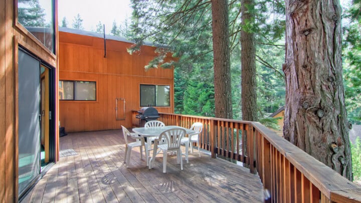 deck with grill and outdoor seating