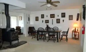 dining room with wood stove